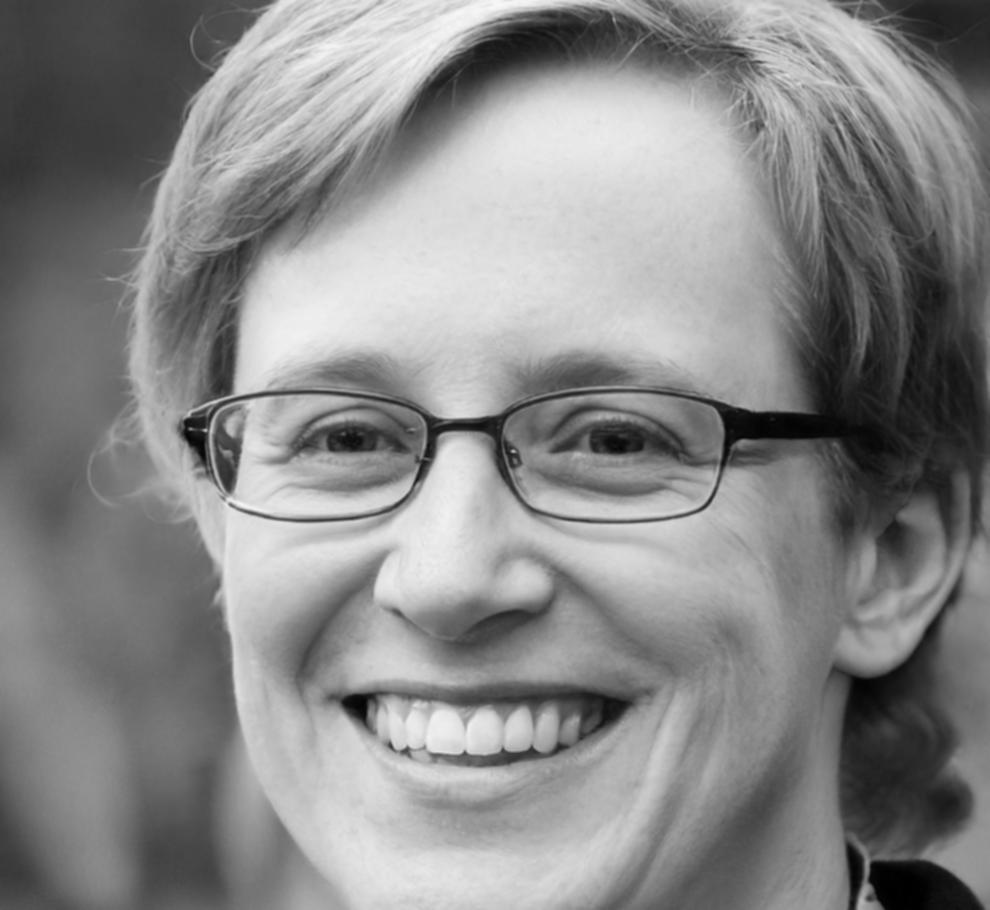 Professional headshot of tea plantation owner